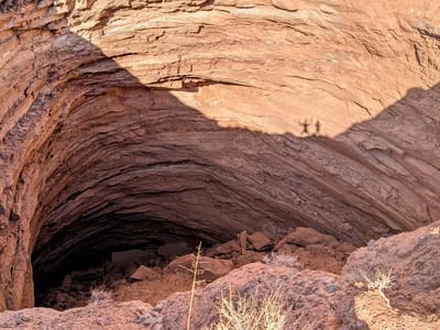 Cathedral Valley: Gypsum sinkhole with our shadows