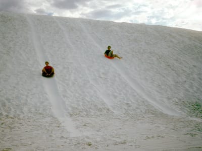 White Sands National Monument: Boy's on saucers, zooming towards a Wal-Mart