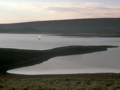 Heron Lake State Park: Lone neighbor sailing at dusk on Heron Lake