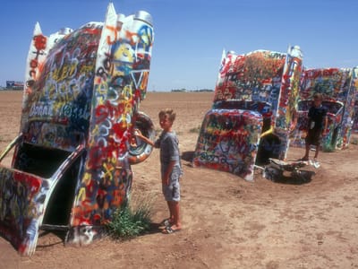 Cadillac Ranch: Boy's painting desert cadillacs