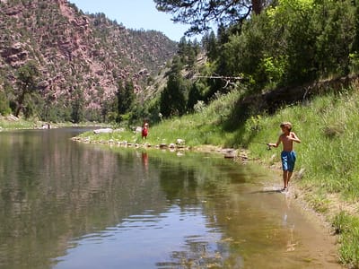Flaming Gorge National Recreation Area Dam: Boys stalking the Green River for trout