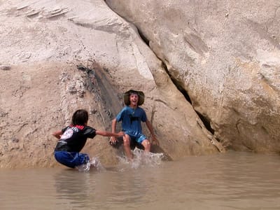 Lake Powell - Wahweap: Boy's demonstrating use of the mudslide