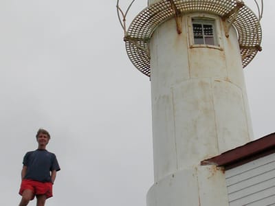 Rocky Harbor: Herb with Lobster Cove Lighthouse
