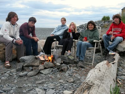 Homer: Gang roasting marshmellows around the beach fire
