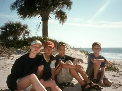 Hunting Island State Park: Kids under Palmetto Palm on beach