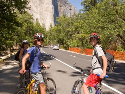 Yosemite Valley: Lolo and boys on bikes approaching El Capitan