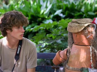 Huntington Beach State Park: Tommy sharing bench with art - AJG