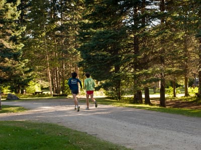 Parc du Mont-Sainte-Anne: Boys running from Parc du Mont-Sainte-Anne Campground