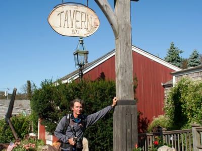 Tisbury: Herb holding up Black Dog Tavern Sign - LEG