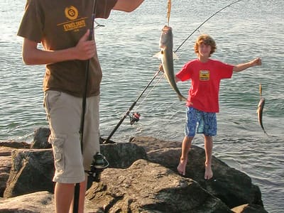Oak Bluffs: Boys catching fish from Jetty
