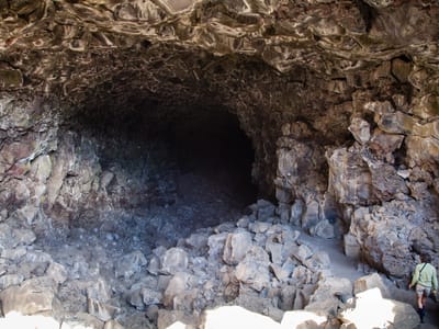 Lava Beds National Monument: Lolo Approaching Lava Tube Cave Entrance