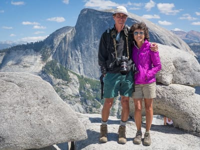 Yosemite National Park: Lolo and Herb at North Dome with Half Dome and Boobs under Rock