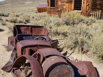 Eastern Sierra (North of  Mono Lake): Bodie Rusted Car with Cabin