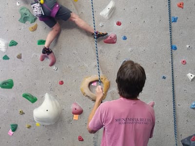 Ohio to Iowa: Herb belaying Kitty at Climb Iowa