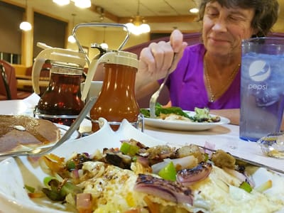 Iowa to Nebraska: Lolo enjoying Dinner at \"The Kitchen\"