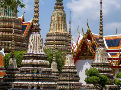 Bangkok: Wat Pho chedis (or stupas) used to house the remains of Buddhist monks or nuns