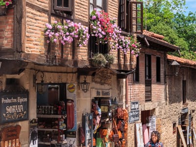 Santillana del Mar and the Altamira Cave: Lolo wandering along the cobblestone streets of Santillana del Mar