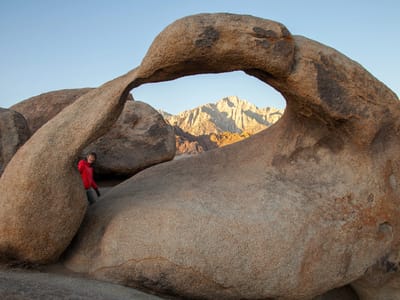 Lone Pine - Alabama Hills and Horseshoe Meadow: Lolo unknowingly walking into my shot of Mobius Arch