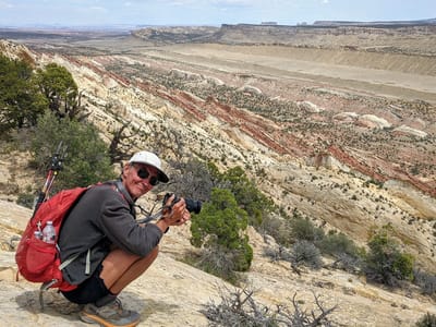 Notom Bullfrog Road, Upper Muley Twist, and the Burr Trail: Herb enjoying the view of the Strike Valley