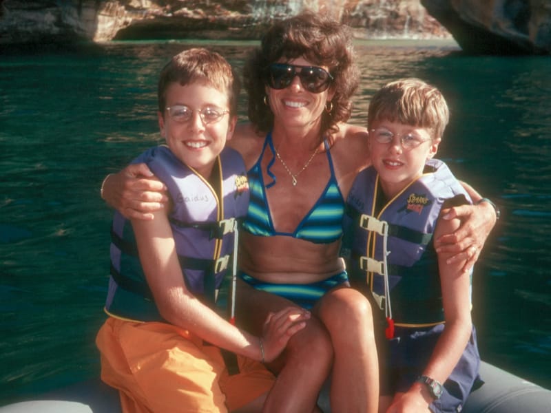 Spouse and boys on raft