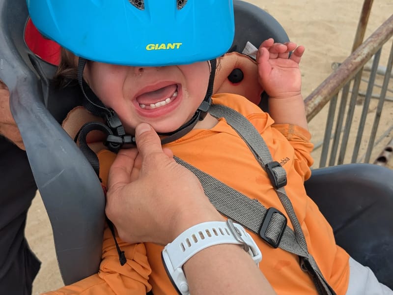 Walker's first time with a bike helmet