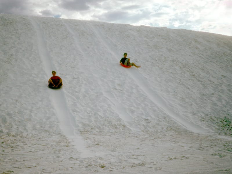 Boy's on saucers, zooming towards a Wal-Mart