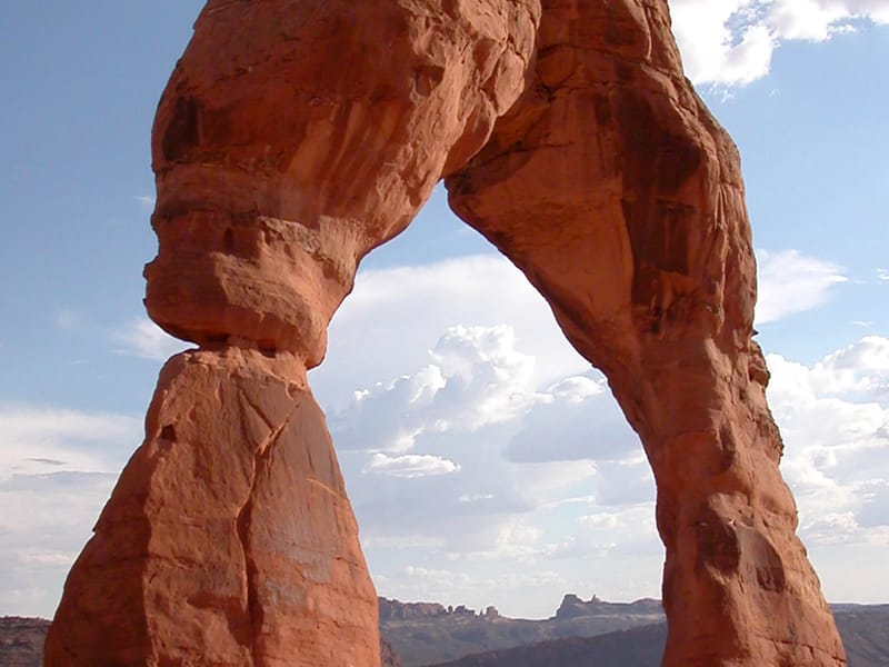 Lolo approaching the Delicate Arch