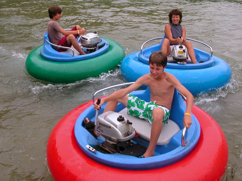 Lolo and boys in Bumper Boats