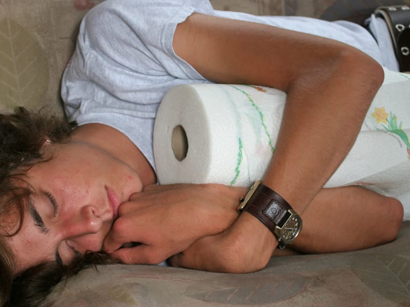 Tired Andrew post travel with paper towels