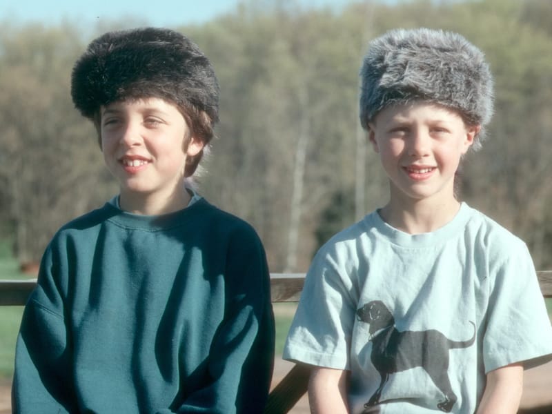 Boy's sporting coonskin hats