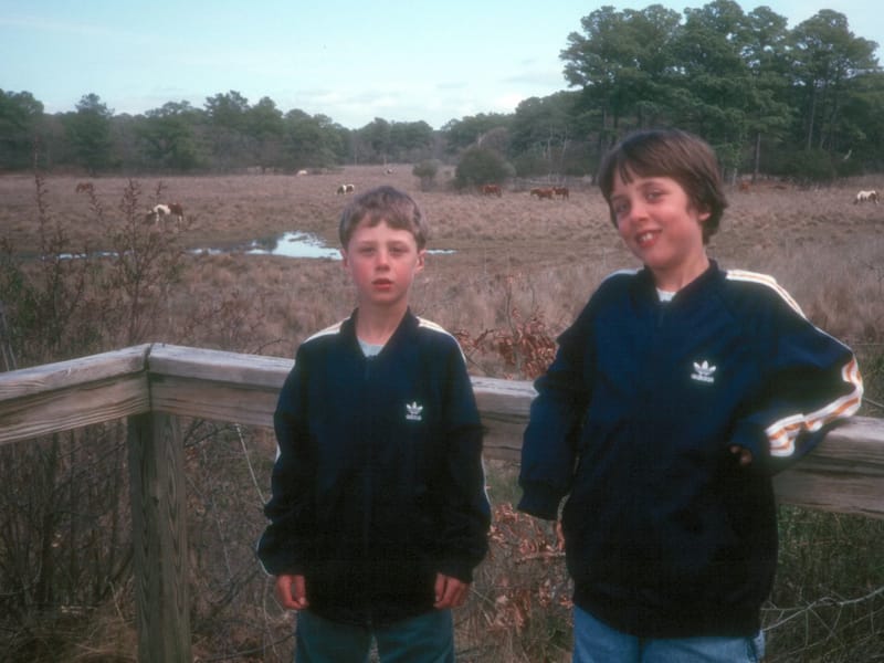 Boys with wild ponies