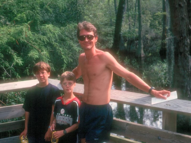 Herb and boys in swamp