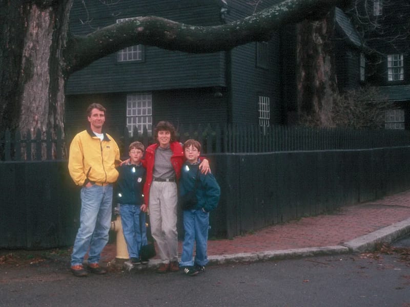 Family in front of House of 7 Gables