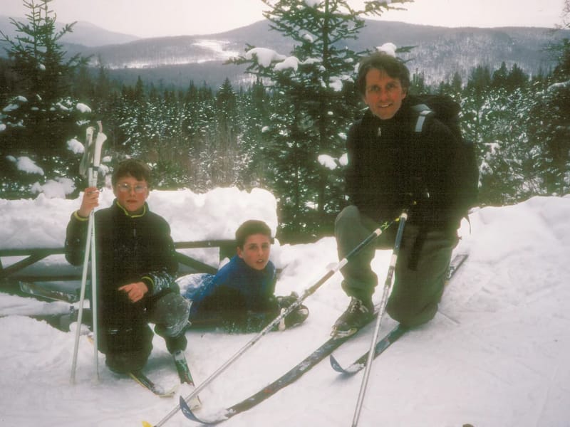 Herb and boys skiing