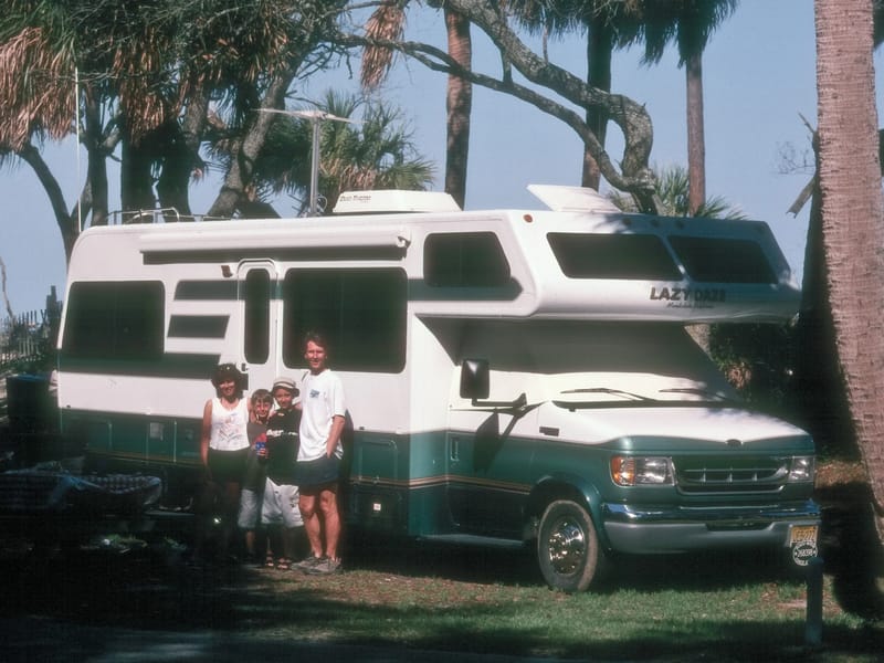 Family with Lazy Daze on beachfront campsite