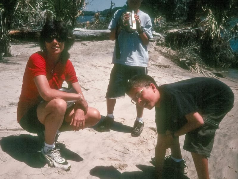 Lolo with boys on beach