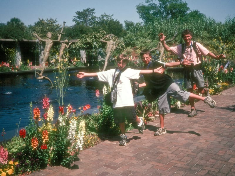 Herb and boys imitating statues