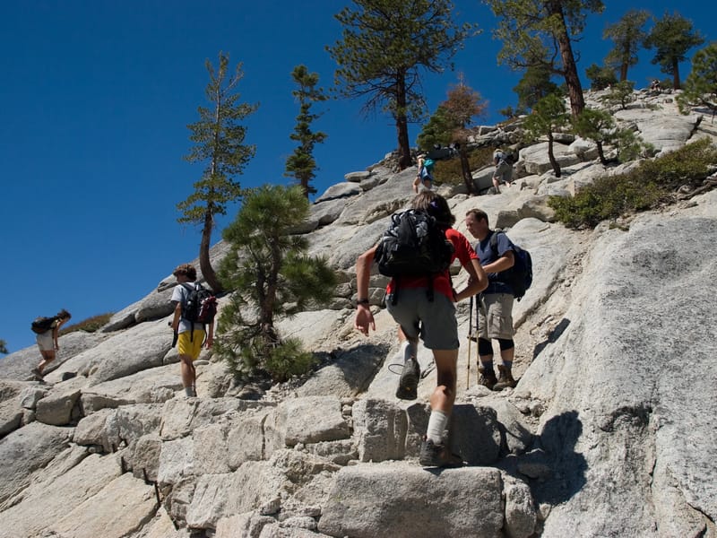 Lolo and boys hiking up Half Dome's shoulder