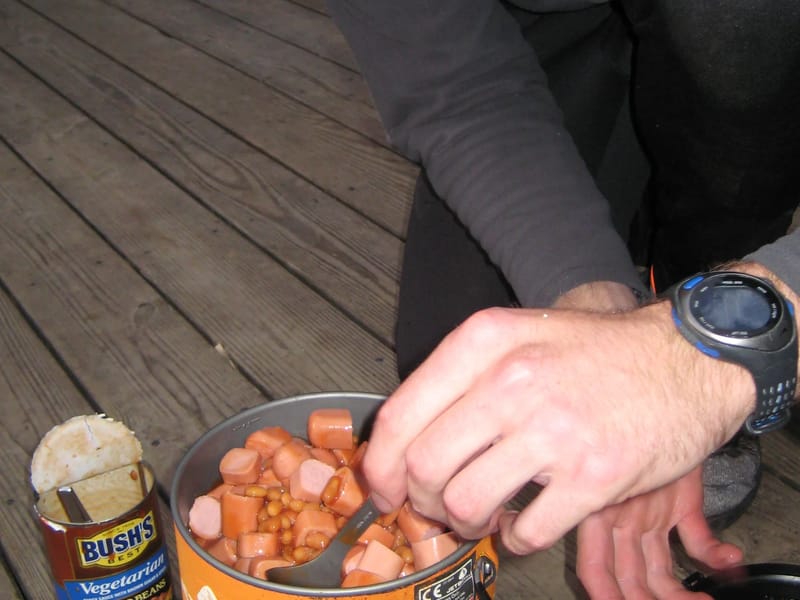 Nik cooking up some beans