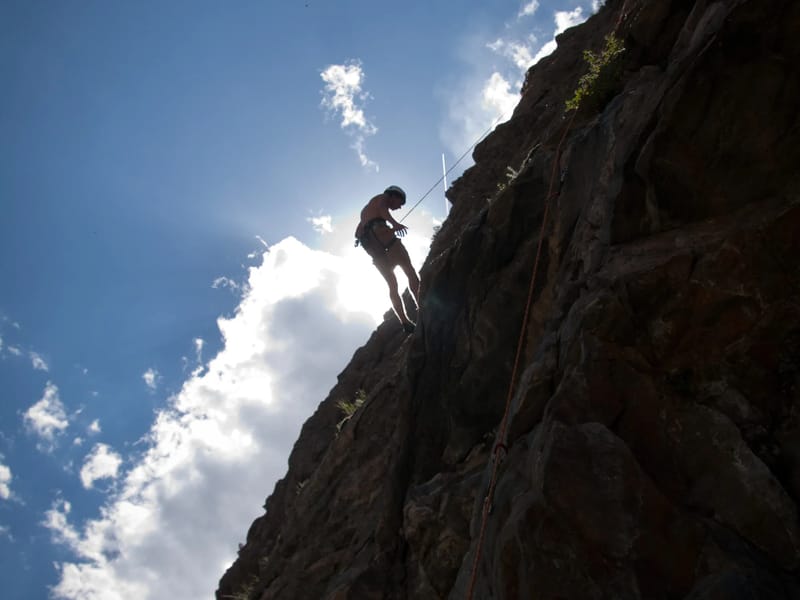 Tom descending Clear Creek Canyon climb - AJG