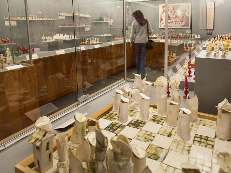Lolo with Chess Sets from Around the World