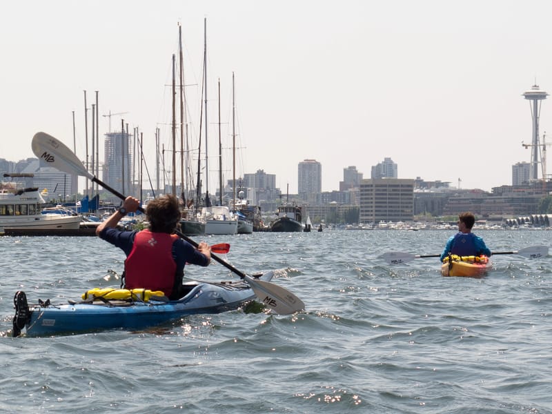 Boys Kayaking in Lake Union with Space Needle