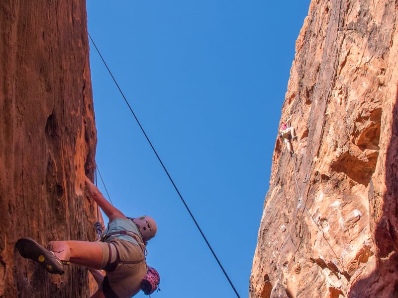 Lolo and Tommy in Black Corridor of Red Rock Canyon