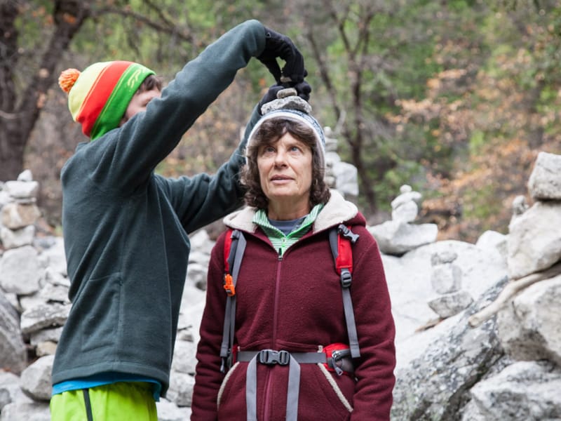 Tommy Building Rock Cairn on Lolo