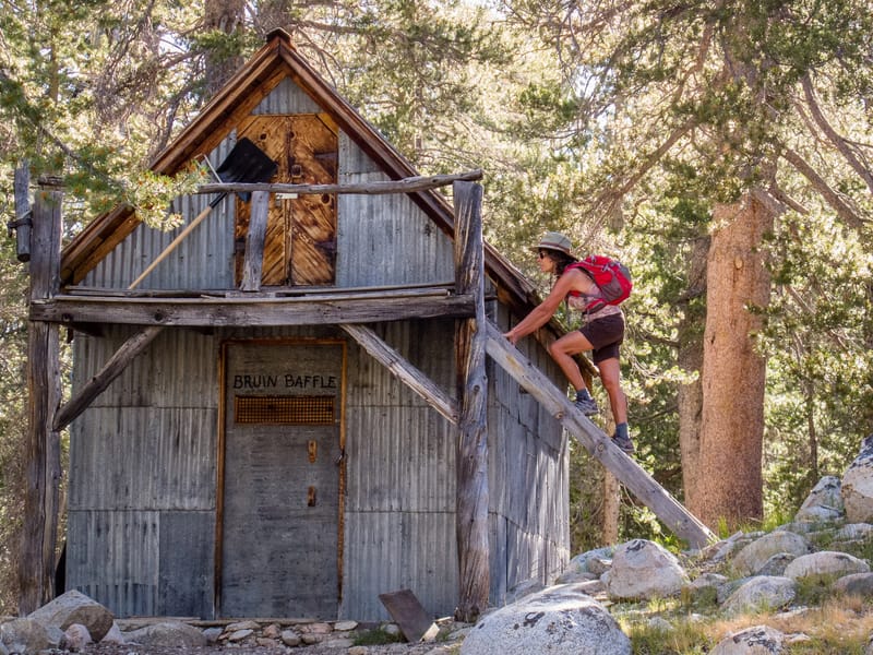 Lolo playing pioneer near old McCauley Cabin