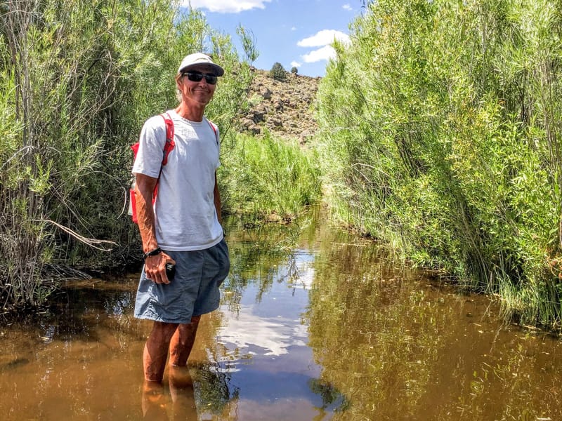 Herb fording the river to Dog Town