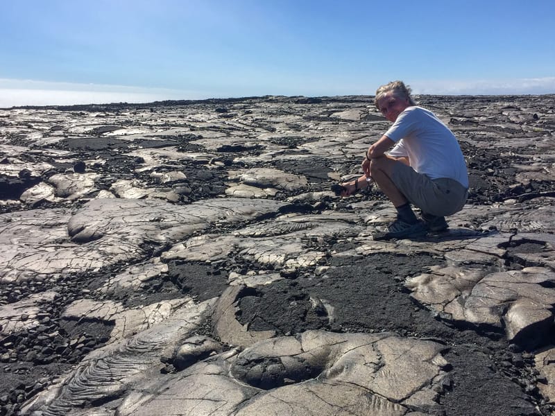 Herb playing with the lava at the end of Chain of Craters Road