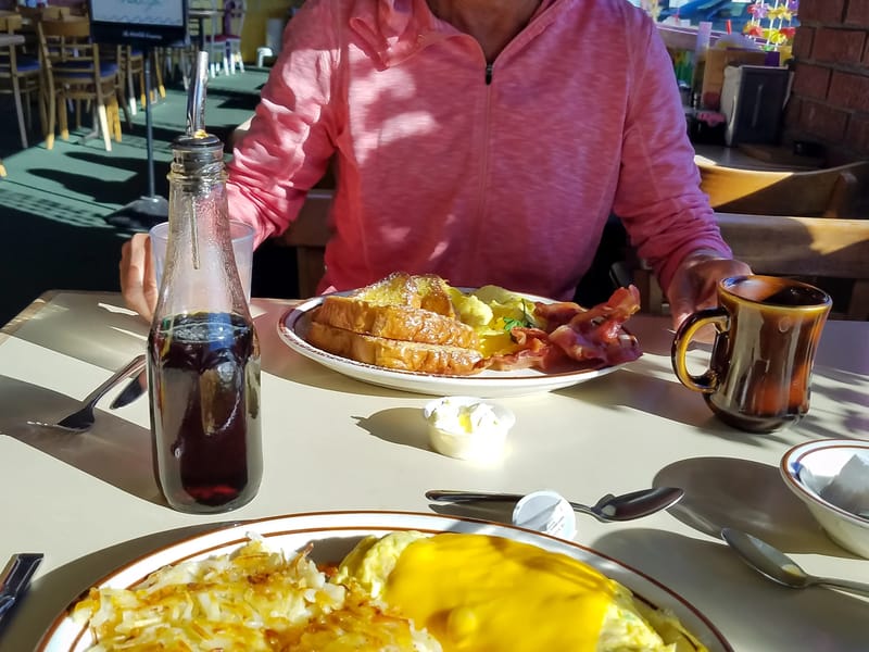 Lolo enjoying something other than a granola bar for breakfast