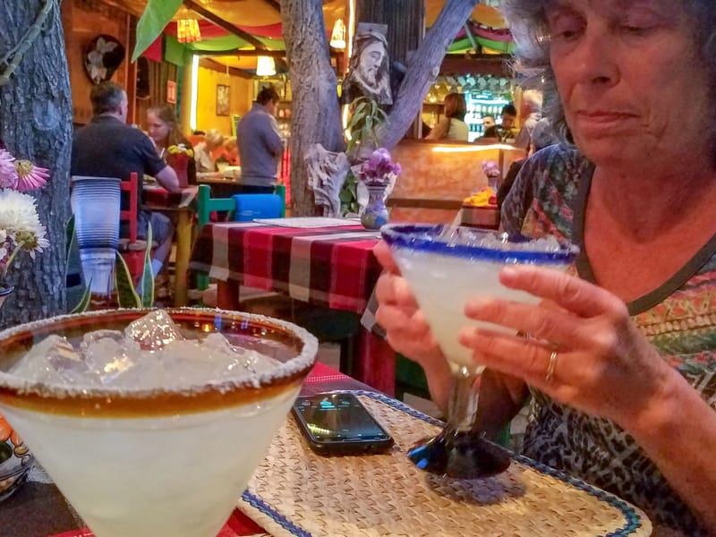 Lolo contemplating her margarita