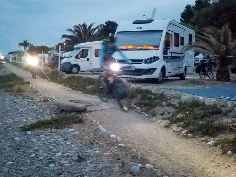 Night time mountain bikers whizzing past our campsite